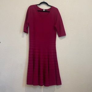 Beautiful drop waist knit dress with pleats.